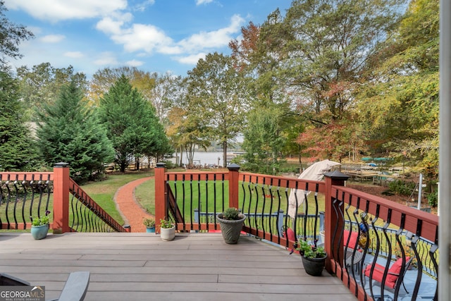 deck featuring a yard