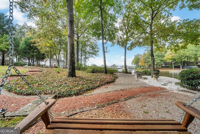 view of property's community featuring a water view