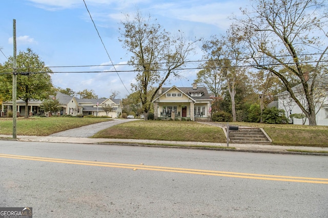 view of front of home with a front lawn