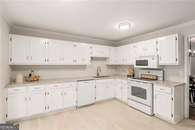 kitchen featuring white cabinetry, sink, light stone counters, ornamental molding, and white appliances