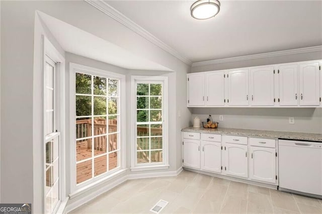 interior space with white cabinets, crown molding, white dishwasher, and light stone countertops