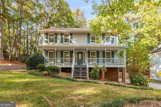 view of front of house featuring a porch and a front lawn