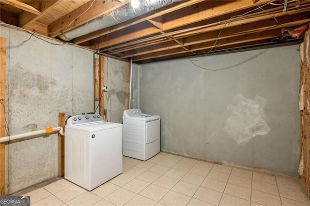 basement featuring washer and dryer