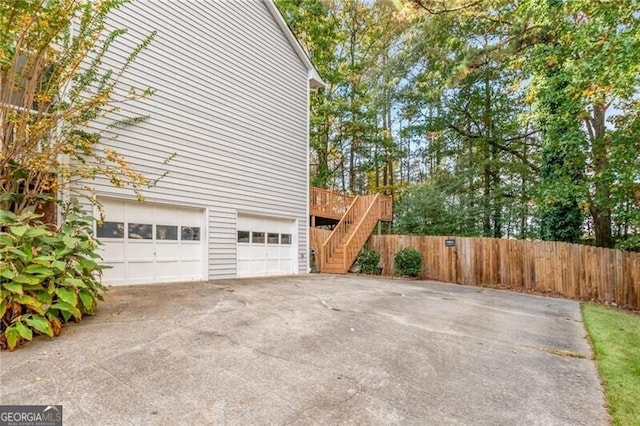 view of property exterior featuring a garage