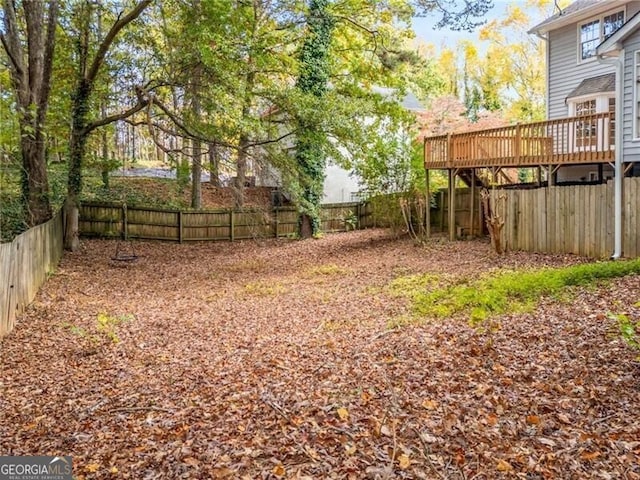 view of yard featuring a deck