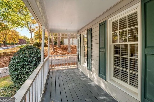 wooden deck featuring a porch