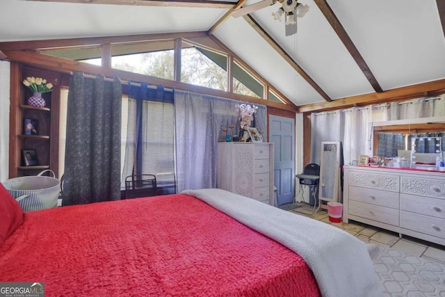2611 Kings Cir, Lawrenceville, GA 30044 - bedroom with vaulted ceiling and tile patterned flooring