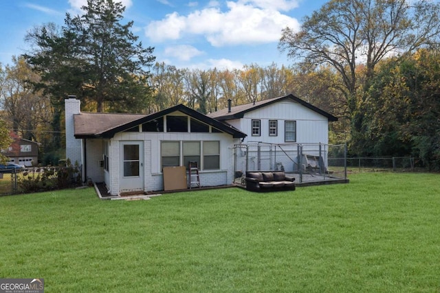 2611 Kings Cir, Lawrenceville, GA 30044 - back of house with a chimney