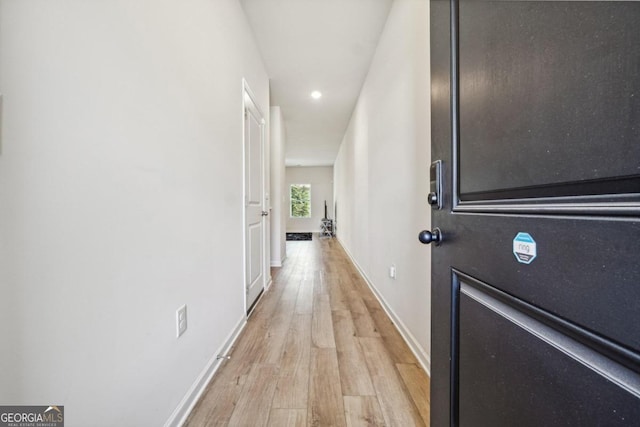 hall featuring light hardwood / wood-style floors