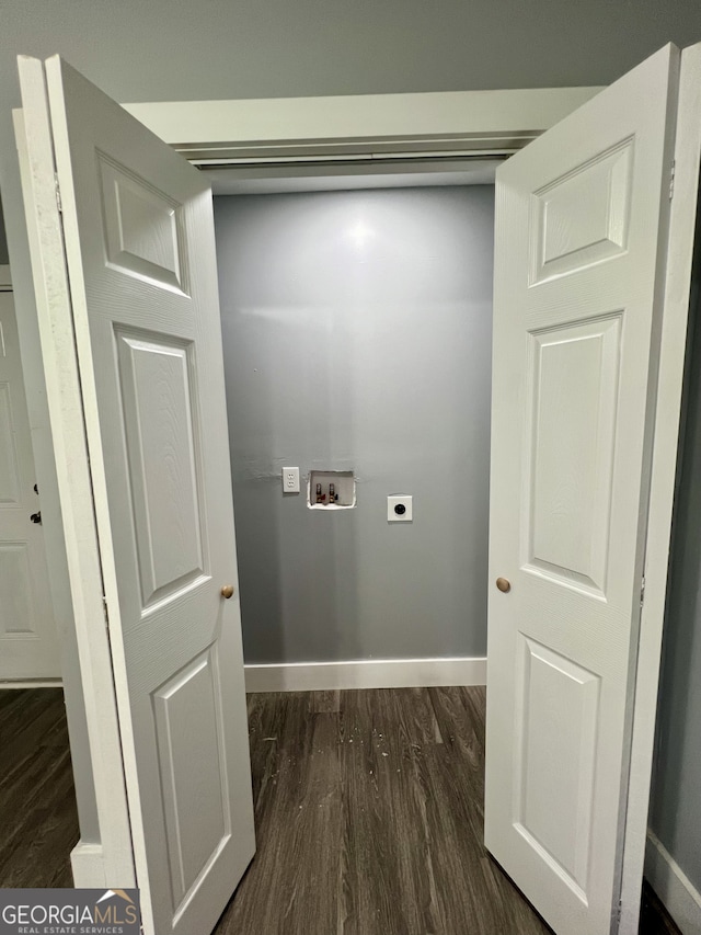 laundry room featuring dark hardwood / wood-style flooring, hookup for a washing machine, and electric dryer hookup