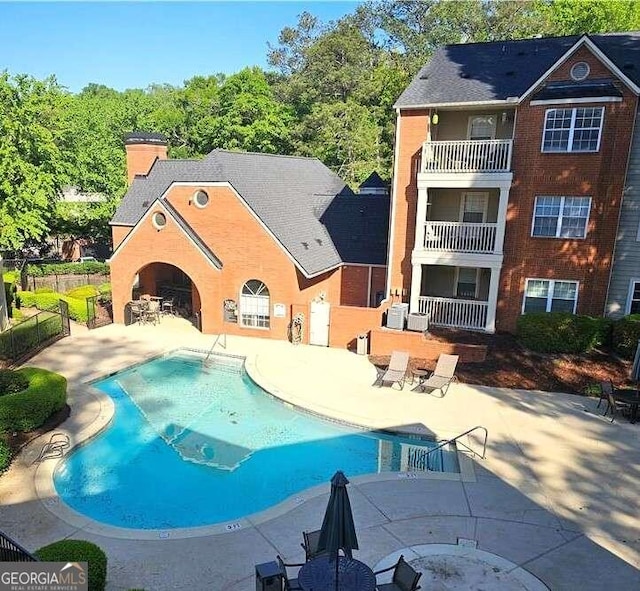 view of pool with a patio