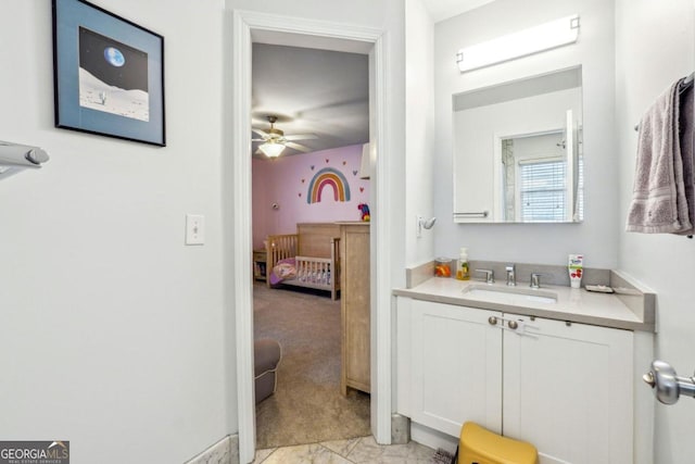 bathroom featuring vanity and ceiling fan