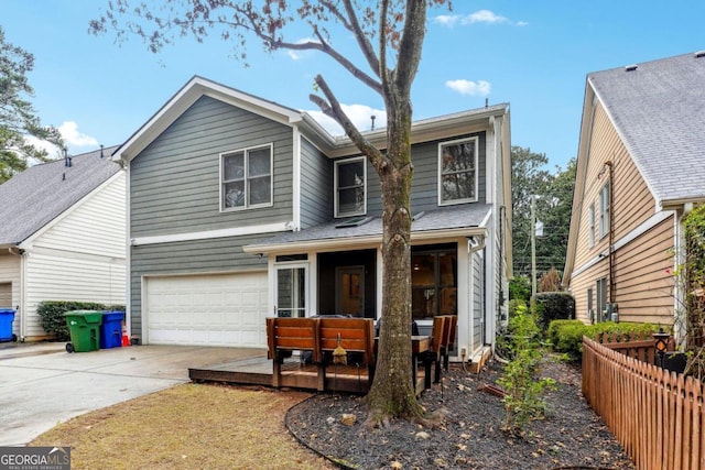 view of front of property featuring a garage