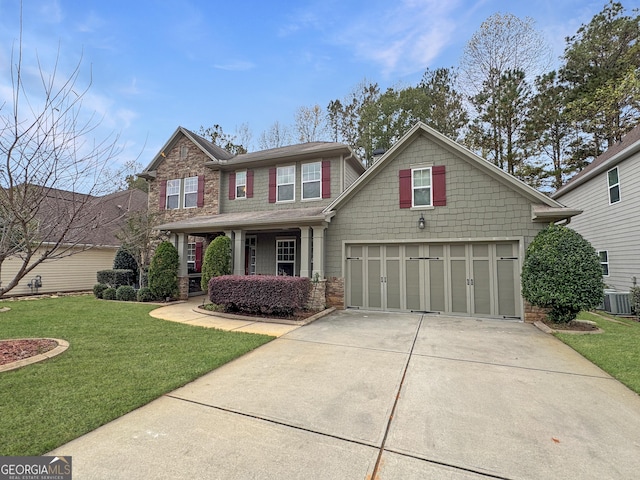 view of front of house featuring central AC, a front yard, and a garage