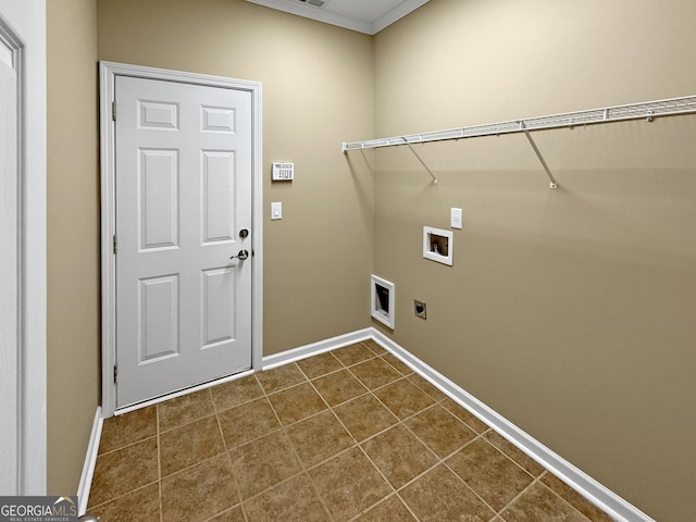 clothes washing area featuring hookup for a washing machine, crown molding, dark tile patterned floors, and electric dryer hookup