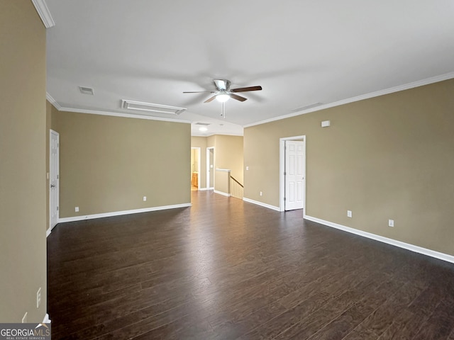 empty room with ceiling fan, dark hardwood / wood-style floors, and ornamental molding