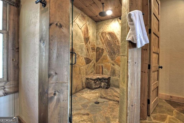 bathroom featuring an enclosed shower