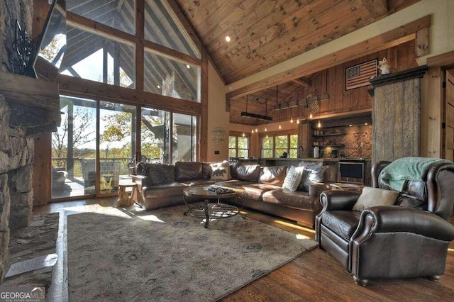 living room featuring dark hardwood / wood-style flooring, beamed ceiling, wood ceiling, and high vaulted ceiling