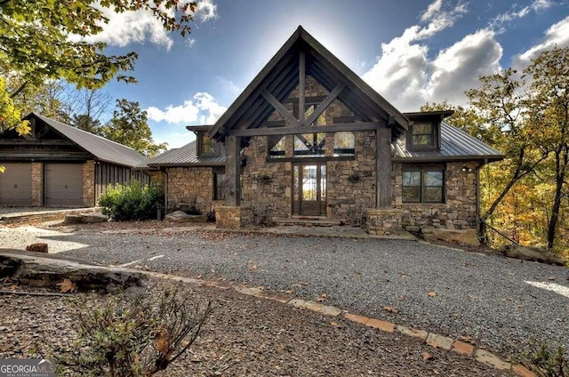 view of front of property with a garage