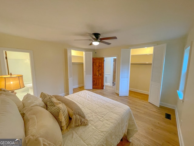 bedroom featuring light wood-type flooring and ceiling fan