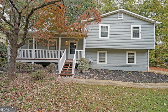 tri-level home featuring a porch