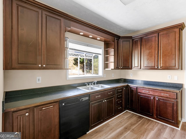 kitchen with dishwasher, a textured ceiling, light wood-type flooring, and sink