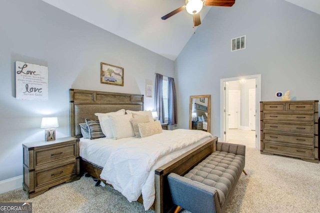 carpeted bedroom with high vaulted ceiling and ceiling fan