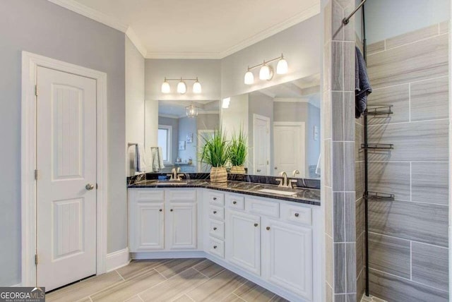 bathroom with vanity and crown molding