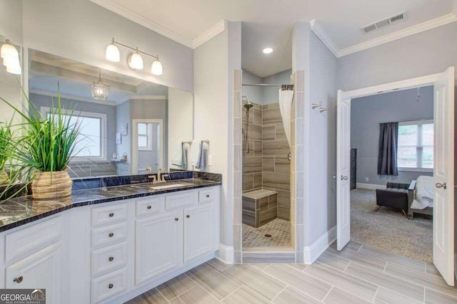 bathroom featuring curtained shower, vanity, and crown molding