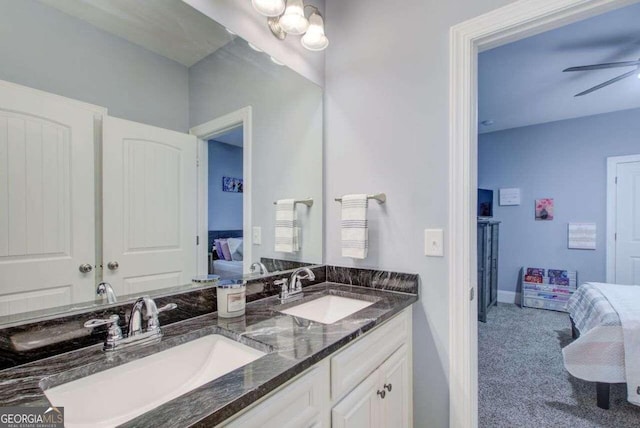 401 Night Hawk Ct, Canton, GA 30114 - ensuite bathroom with double vanity, a ceiling fan, and baseboards