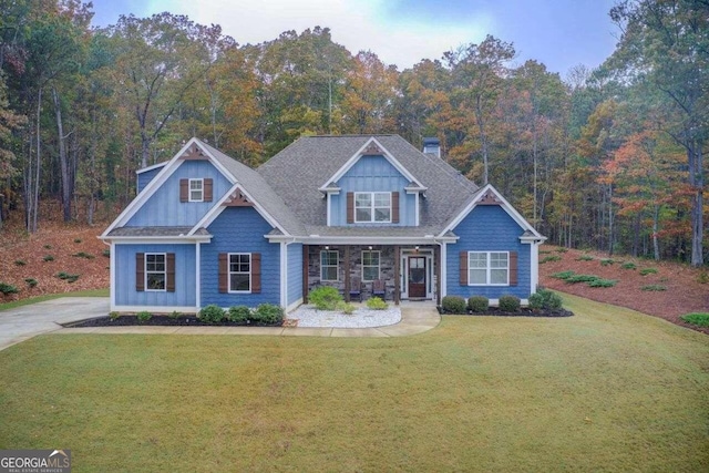 craftsman-style house with a front lawn