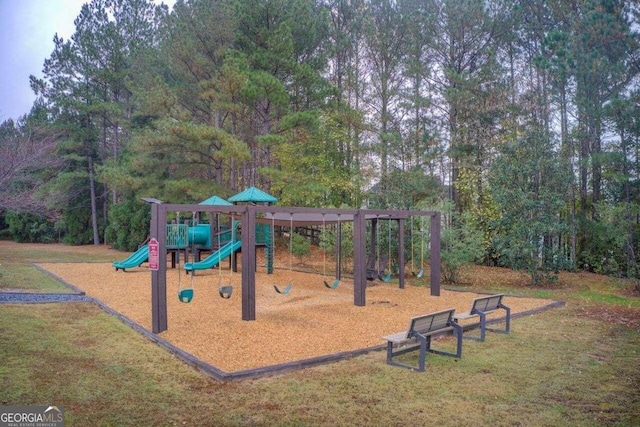 view of playground featuring a lawn