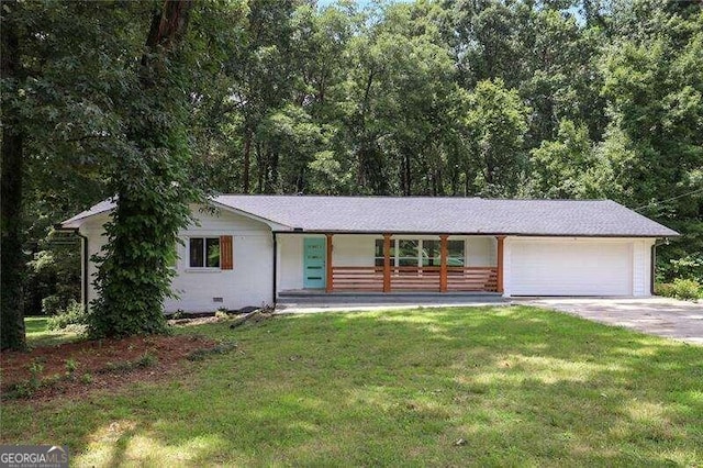 ranch-style house with a front lawn, a garage, and a porch