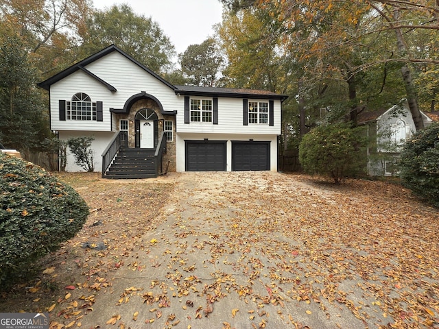 split foyer home featuring a garage