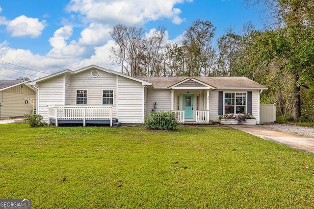 ranch-style house featuring a front lawn