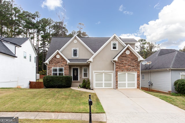 view of front property featuring a garage and a front lawn