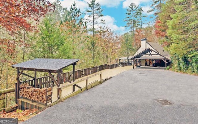 7670 Hiawassee Wilderness Trl, Hiawassee, GA 30546 - view of home's community with a forest view