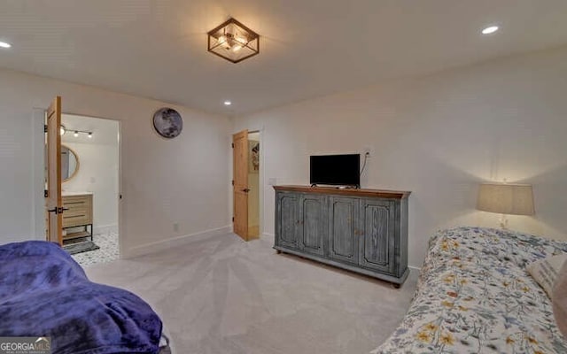 bedroom featuring light colored carpet