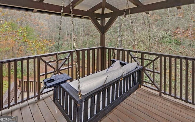 wooden deck featuring a gazebo