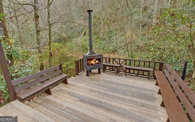 7670 Hiawassee Wilderness Trl, Hiawassee, GA 30546 - wooden deck featuring a view of trees