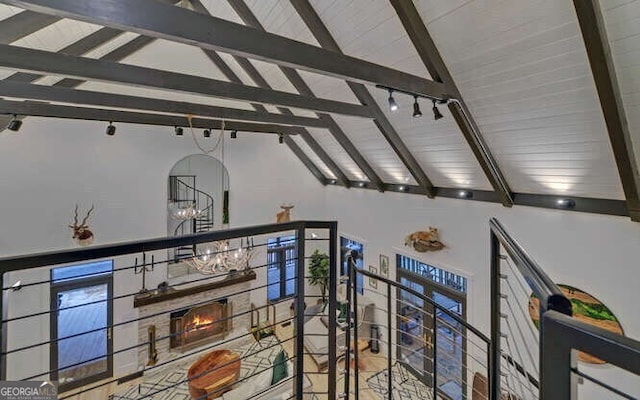 interior space featuring a fireplace and beam ceiling