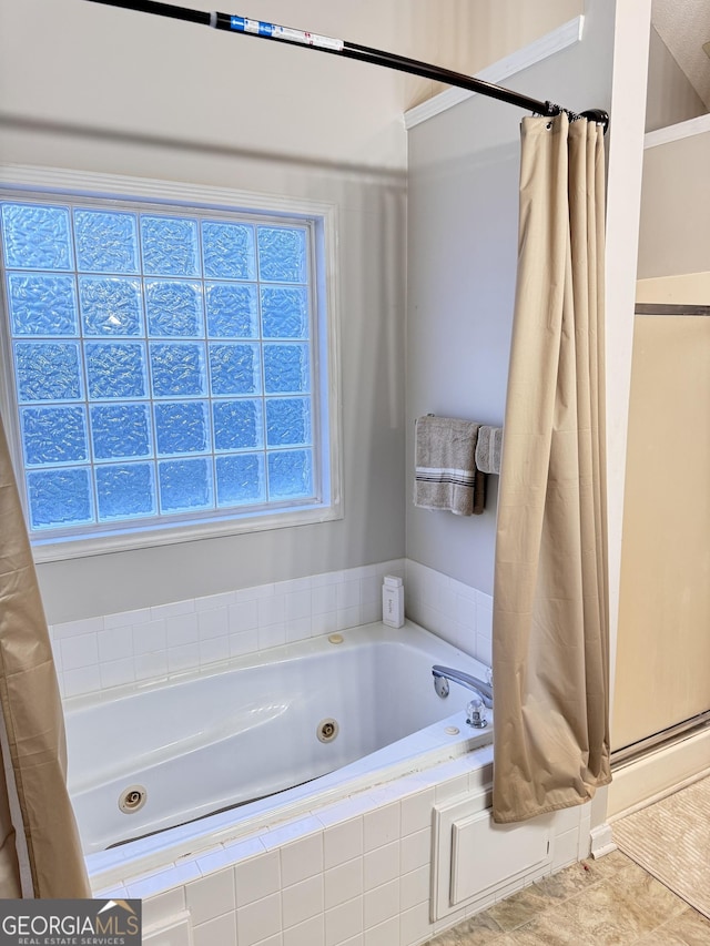 bathroom with independent shower and bath