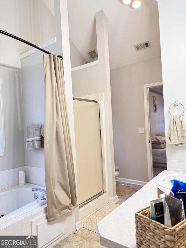 full bathroom featuring vaulted ceiling, toilet, a textured ceiling, vanity, and plus walk in shower