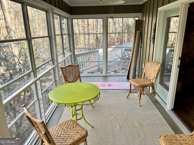 sunroom / solarium featuring a wealth of natural light