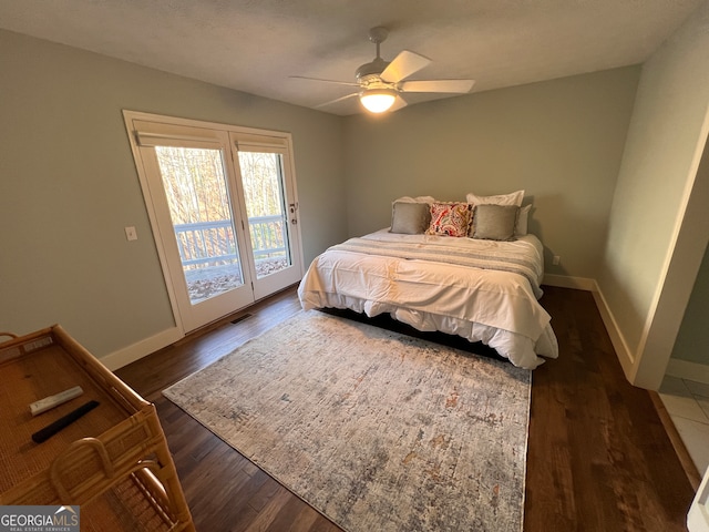 bedroom with ceiling fan, access to exterior, and dark hardwood / wood-style flooring