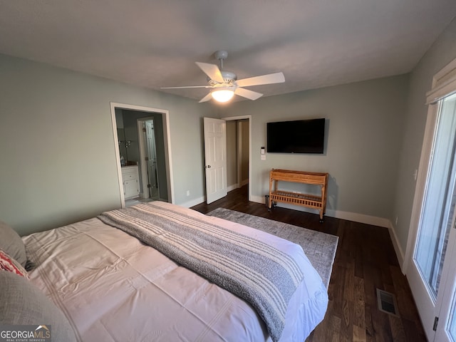 bedroom with ensuite bath, ceiling fan, and dark hardwood / wood-style floors