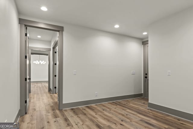 spare room featuring hardwood / wood-style floors