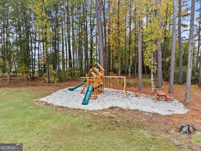 view of playground featuring a lawn