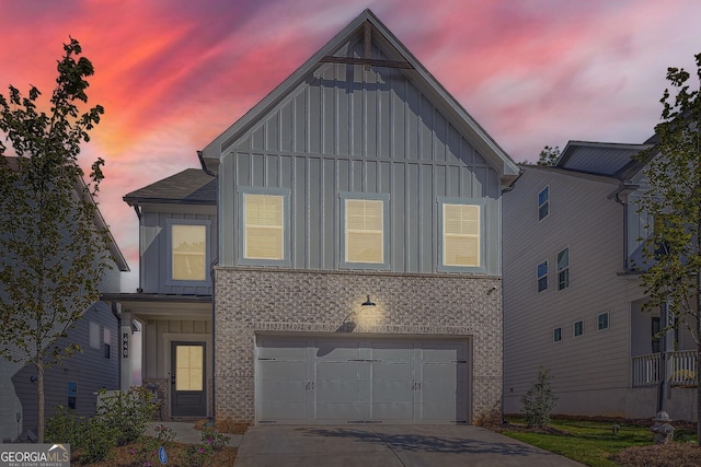 view of front of home with a garage