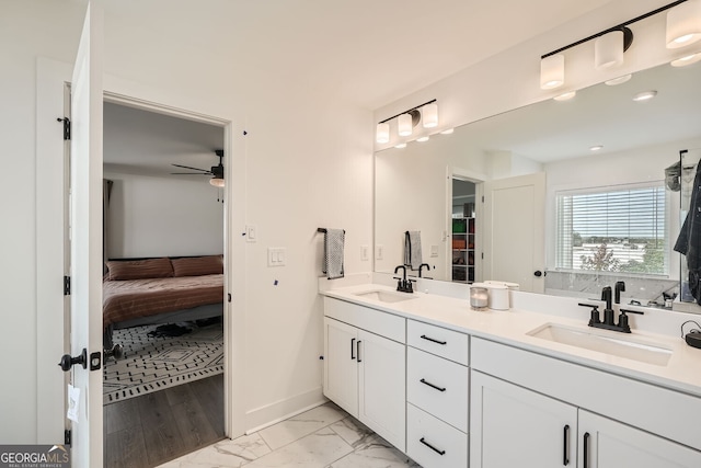 bathroom with vanity and ceiling fan